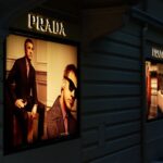 advertising, advertising board, advertising sign, advertising poster, prada, overhead projector, neon sign, brand, outdoor advertising, billboard, reklameschild, lighting, man, fashion, prada, prada, prada, prada, prada, billboard