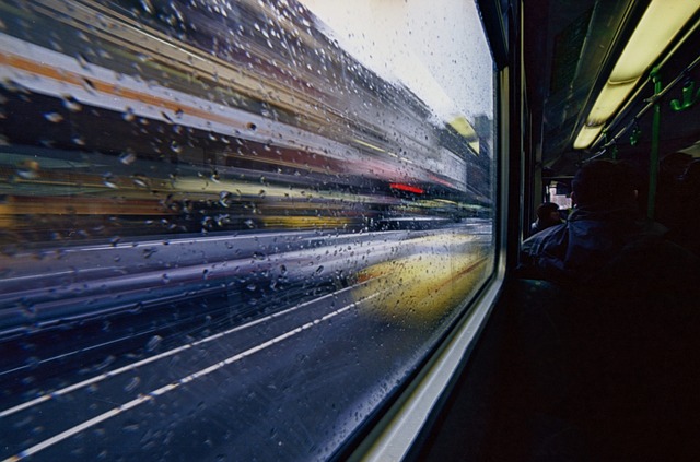 tram, bus, raindrops, glass window, transportation, urban, street, city, vehicle, speed, road, traffic, window, downtown, bus, bus, bus, bus, bus